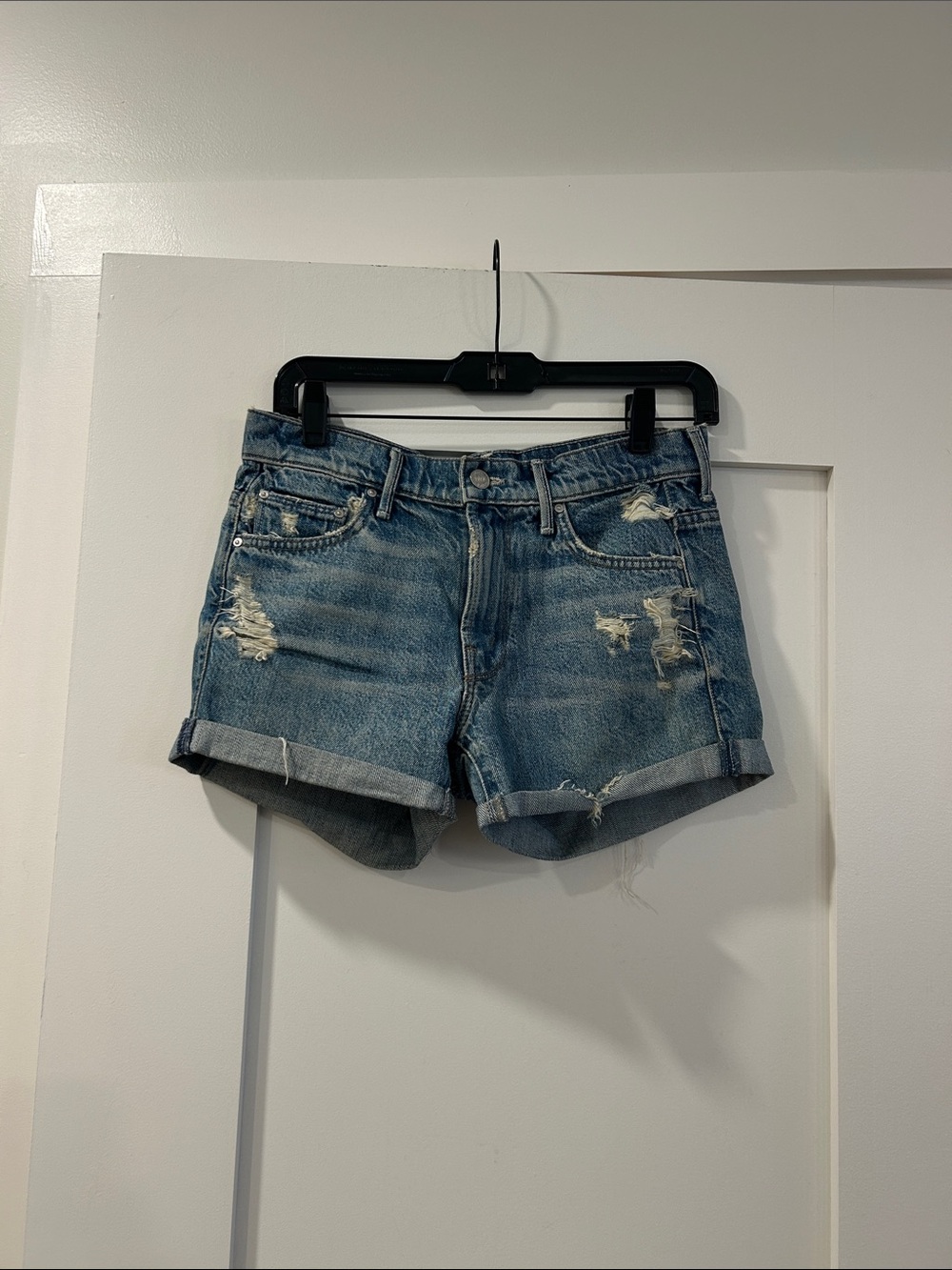 Mother “The Teaser” Roll Distressed Blue Denim Shorts, 24